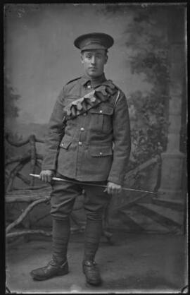 [Soldier wearing bandolier]