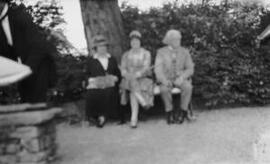 [David & Margaret Lloyd George on a bench]