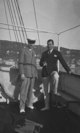 [A J Sylvester and Sir Thomas Carey Evans aboard 'Sabrina']