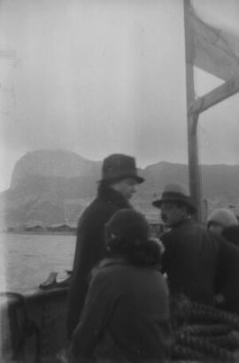 [Group of people on deck of a ship]